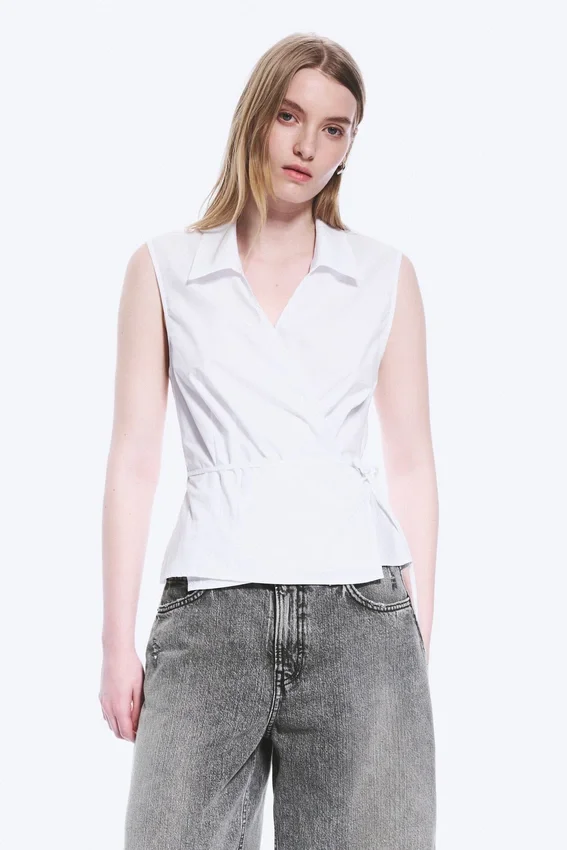 Top cruzado sin mangas de algodón – Blanco Top cruzado sin mangas de algodón – Blanco
