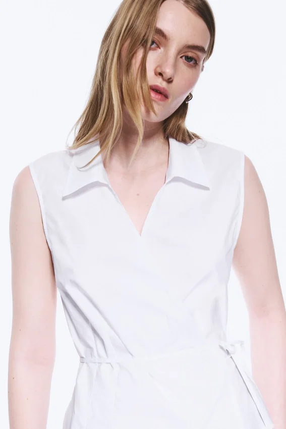 Top cruzado sin mangas de algodón – Blanco Top cruzado sin mangas de algodón – Blanco