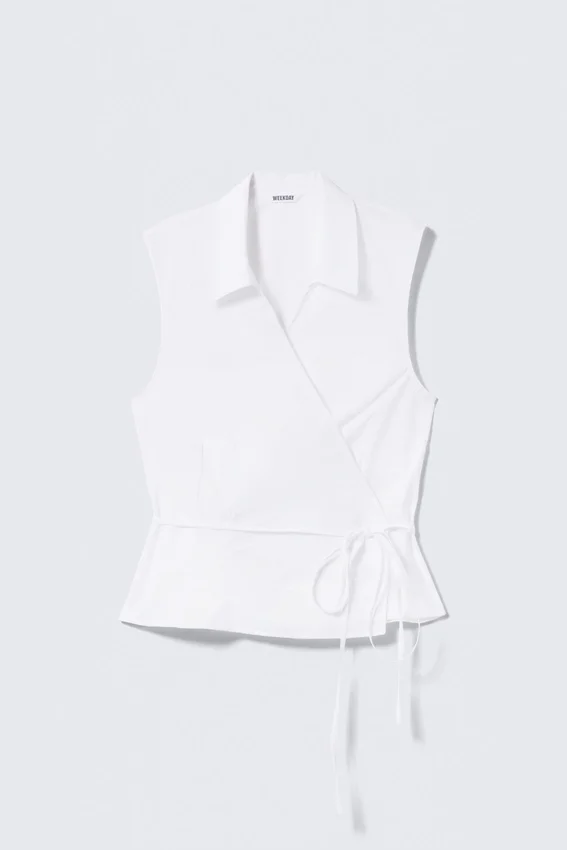 Top cruzado sin mangas de algodón – Blanco Top cruzado sin mangas de algodón – Blanco