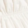 Top de algodón con cuello halter – blanco roto Top de algodón con cuello halter – blanco roto