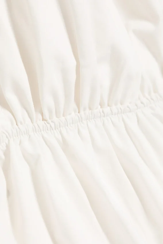 Top de algodón con cuello halter – blanco roto Top de algodón con cuello halter – blanco roto