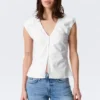 Top de algodón sin mangas con cuello en V – Blanco Top de algodón sin mangas con cuello en V – Blanco