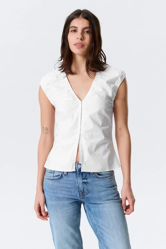 Top de algodón sin mangas con cuello en V – Blanco Top de algodón sin mangas con cuello en V – Blanco