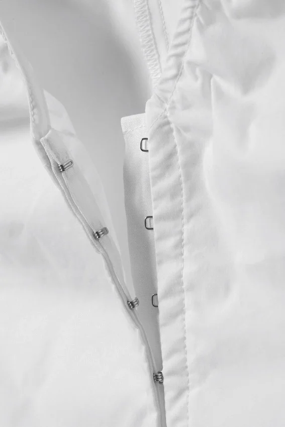 Top de algodón sin mangas con cuello en V – Blanco Top de algodón sin mangas con cuello en V – Blanco