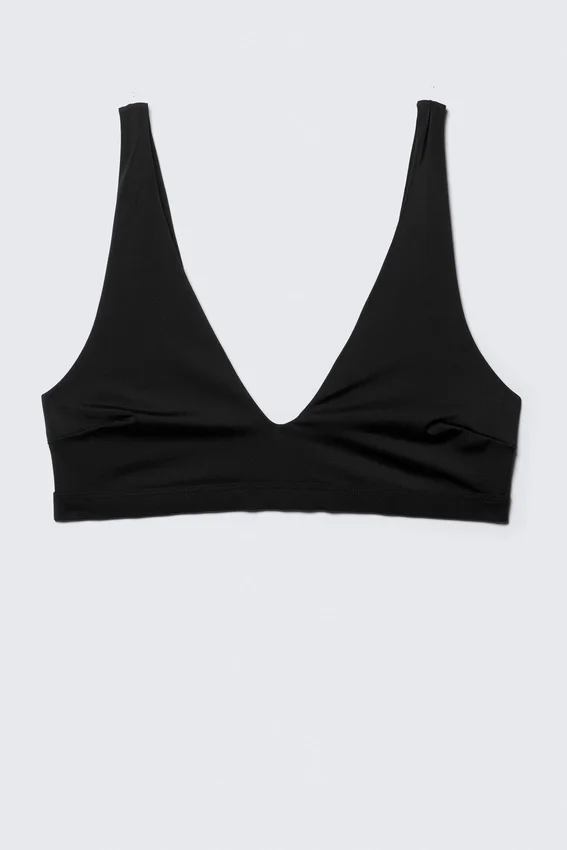 Top de bikini con escote pronunciado y ajuste elástico – Negro Top de bikini con escote pronunciado y ajuste elástico – Negro