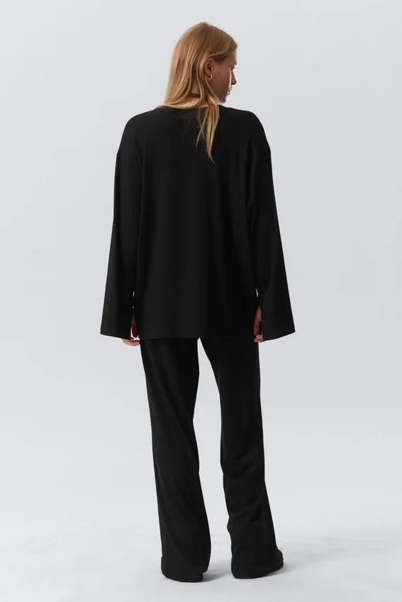 Top de jersey de manga larga de corte holgado – Negro Top de jersey de manga larga de corte holgado – Negro