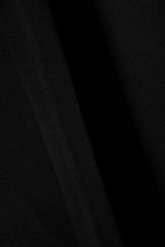 Top de lyocell con un solo hombro y lazo – Negro Top de lyocell con un solo hombro y lazo – Negro