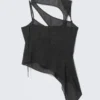 Top de malla con aberturas asimétricas – Gris oscuro – Lunares Top de malla con aberturas asimétricas – Gris oscuro – Lunares
