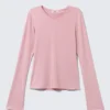Top de manga larga con cuello en V – Rosa claro Top de manga larga con cuello en V – Rosa claro