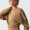 Top de manga larga con pliegues – Beige oscuro Top de manga larga con pliegues – Beige oscuro