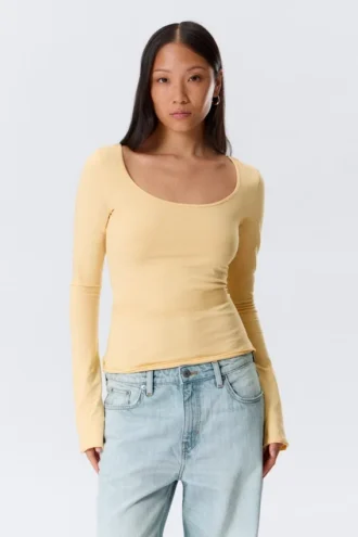 Top de manga larga, corte entallado y cuello redondo – Amarillo claro