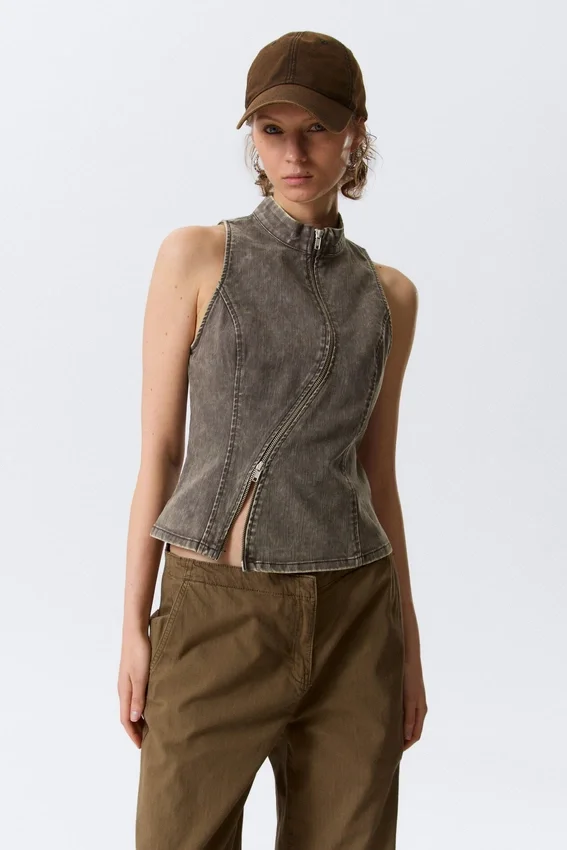 Top sin mangas con cremallera curvada – Gris oscuro Top sin mangas con cremallera curvada – Gris oscuro