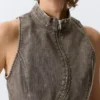 Top sin mangas con cremallera curvada – Gris oscuro Top sin mangas con cremallera curvada – Gris oscuro