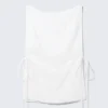 Top sin mangas con cuello barco y lazo – Blanco