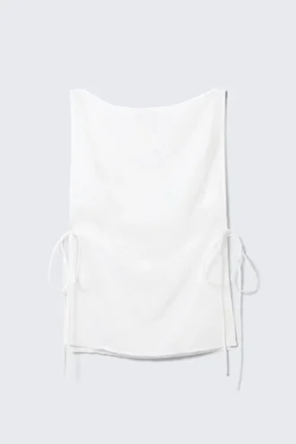 Top sin mangas con cuello barco y lazo – Blanco