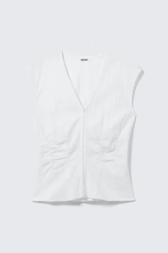 Top sin mangas con efecto arrugado – Blanco