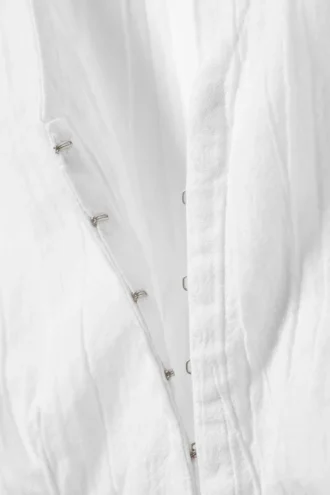 Top sin mangas con efecto arrugado – Blanco