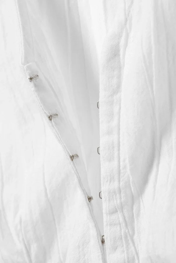 Top sin mangas con efecto arrugado – Blanco Top sin mangas con efecto arrugado – Blanco