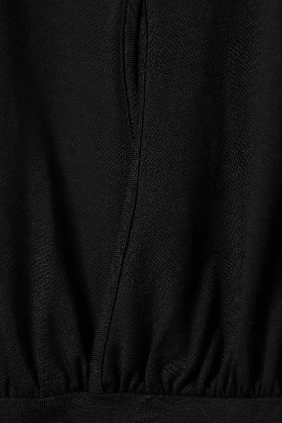 Top sin mangas de cuello alto – Negro Top sin mangas de cuello alto – Negro