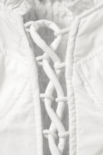 Top tipo corsé con cordones y volantes – Blanco