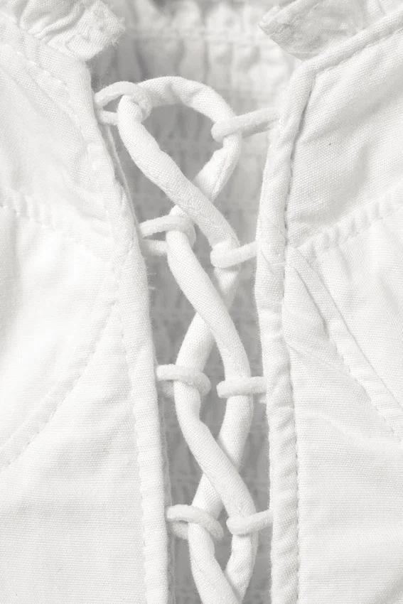 Top tipo corsé con cordones y volantes – Blanco Top tipo corsé con cordones y volantes – Blanco