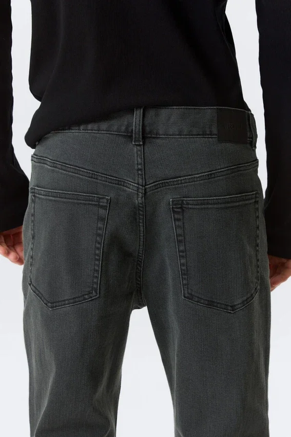 Vaqueros bootcut holgados con efecto elástico – Elegie Black – Negro Vaqueros bootcut holgados con efecto elástico – Elegie Black – Negro