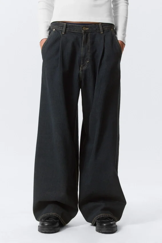 Vaqueros holgados con pliegues – Lavado esmeralda – Azul oscuro Vaqueros holgados con pliegues – Lavado esmeralda – Azul oscuro