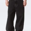 Vaqueros holgados de cintura media con bolsillos de imitación de cuero Astro – Lavado negro – Negro Vaqueros holgados de cintura media con bolsillos de imitación de cuero Astro – Lavado negro – Negro