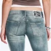 Vaqueros pitillo de talle bajo con corte acampanado Booty Bei – Azul nublado – Azul medio | Cheap Monday Gb