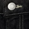 Vaqueros slim de talle bajo y corte acampanado – Lavado negro – Negro