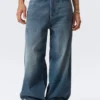 Vaqueros unisex Loose Baggy de talle medio Astro – Blue Hymn – Azul medio Vaqueros unisex Loose Baggy de talle medio Astro – Blue Hymn – Azul medio