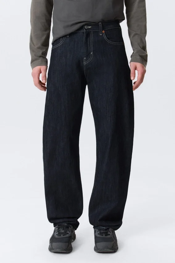 Vaqueros unisex Nebula de talle medio y corte holgado tipo Barrel – Blue Rinse – Azul oscuro Vaqueros unisex Nebula de talle medio y corte holgado tipo Barrel – Blue Rinse – Azul oscuro