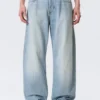 Vaqueros unisex Nebula de talle medio y corte holgado tipo Barrel – Kimberley Blue – Azul claro Vaqueros unisex Nebula de talle medio y corte holgado tipo Barrel – Kimberley Blue – Azul claro