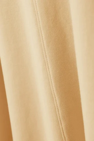 Vestido camiseta de manga corta con corte en A – Beige