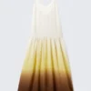 Vestido largo de algodón estampado con volantes – Blanco/Amarillo/Marrón – Degradado Vestido largo de algodón estampado con volantes – Blanco/Amarillo/Marrón – Degradado