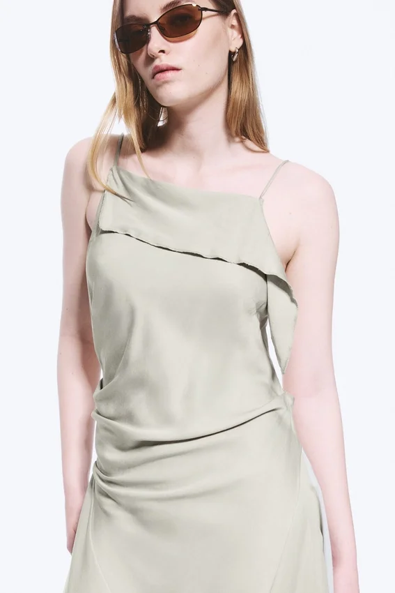 Vestido midi asimétrico sin mangas con cuello vuelto – Light Mole Vestido midi asimétrico sin mangas con cuello vuelto – Light Mole