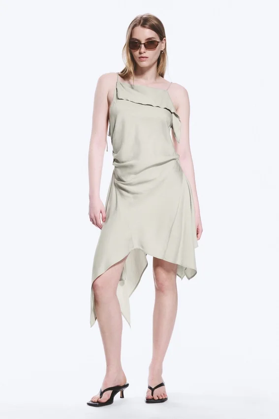 Vestido midi asimétrico sin mangas con cuello vuelto – Light Mole Vestido midi asimétrico sin mangas con cuello vuelto – Light Mole