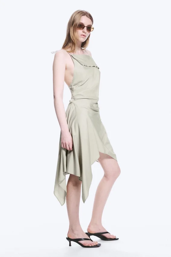 Vestido midi asimétrico sin mangas con cuello vuelto – Light Mole Vestido midi asimétrico sin mangas con cuello vuelto – Light Mole
