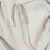 Vestido midi asimétrico sin mangas con cuello vuelto – Light Mole Vestido midi asimétrico sin mangas con cuello vuelto – Light Mole